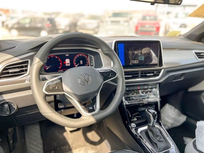 New Volkswagen T-Roc I Facelift, 1.5 l, 2025 in Dubai by Al Rawnaq Motors , White color. Chinese Specs | AUTO.AE