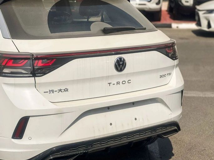 New Volkswagen T-Roc I Facelift, 1.5 l, 2025 in Dubai by Al Rawnaq Motors , White color. Chinese Specs | AUTO.AE