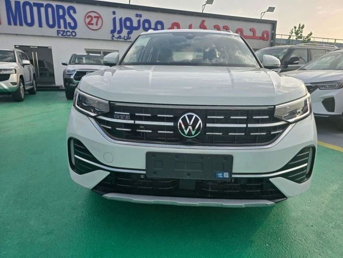 New Volkswagen Tayron I Facelift, 1.4 l, 2024 in Dubai by Mohamed Hakim Motors, White color. Chinese Specs | AUTO.AE