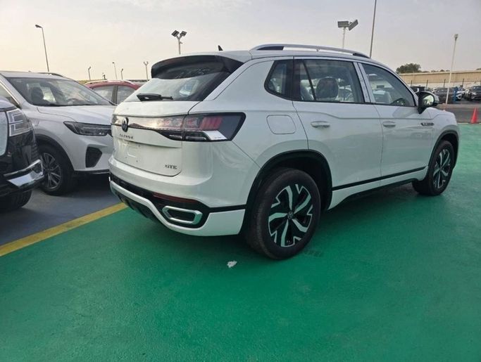 New Volkswagen Tayron I Facelift, 1.4 l, 2024 in Dubai by Mohamed Hakim Motors, White color. Chinese Specs | AUTO.AE