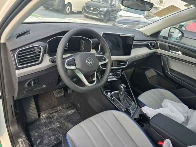 New Volkswagen Tayron I Facelift, 1.4 l, 2024 in Dubai by Mohamed Hakim Motors, White color. Chinese Specs | AUTO.AE