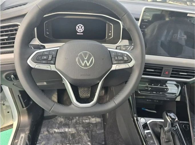 New Volkswagen Tayron I Facelift, 1.4 l, 2024 in Dubai by Mohamed Hakim Motors, White color. Chinese Specs | AUTO.AE