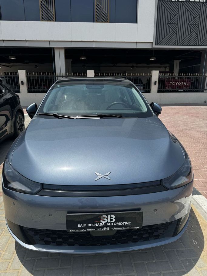 New Xpeng P5, 2023 in Dubai by Evxport, Navy Blue color. Chinese Specs | AUTO.AE