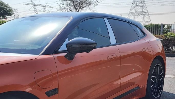 New Zeekr 001 I Facelift, 2024 in Dubai by Alwan Global Cars, Orange color. Other | AUTO.AE