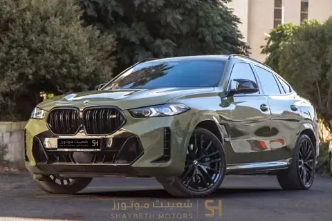 مستعملة BMW X6 M60i xDrive عملية فيس ليفت III (G06)، 4.4 لتر، 2024 في الأردن، عمان من SHAYBETH MOTORS، اللون أخضر.  | AUTO.AE | إعلان #295652 — صورة 2 من 10