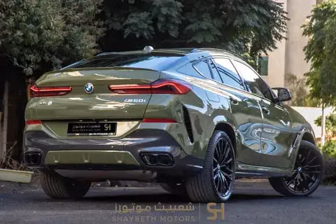 مستعملة BMW X6 M60i xDrive عملية فيس ليفت III (G06)، 4.4 لتر، 2024 في الأردن، عمان من SHAYBETH MOTORS، اللون أخضر.  | AUTO.AE | إعلان #295652 — صورة 3 من 10