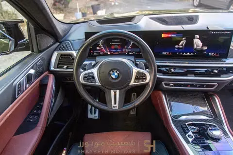 مستعملة BMW X6 M60i xDrive عملية فيس ليفت III (G06)، 4.4 لتر، 2024 في الأردن، عمان من SHAYBETH MOTORS، اللون أخضر.  | AUTO.AE | إعلان #295652 — صورة 5 من 10
