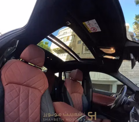 مستعملة BMW X6 M60i xDrive عملية فيس ليفت III (G06)، 4.4 لتر، 2024 في الأردن، عمان من SHAYBETH MOTORS، اللون أخضر.  | AUTO.AE | إعلان #295652 — صورة 8 من 10