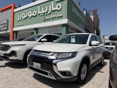 Used ⁦Mitsubishi Outlander III Facelift 3, 2.4 l, 2022⁩ in Kuwait, Al Farwānīyah by MARBEYA MOTORS, White color.  | AUTO.AE | Listing #286983
