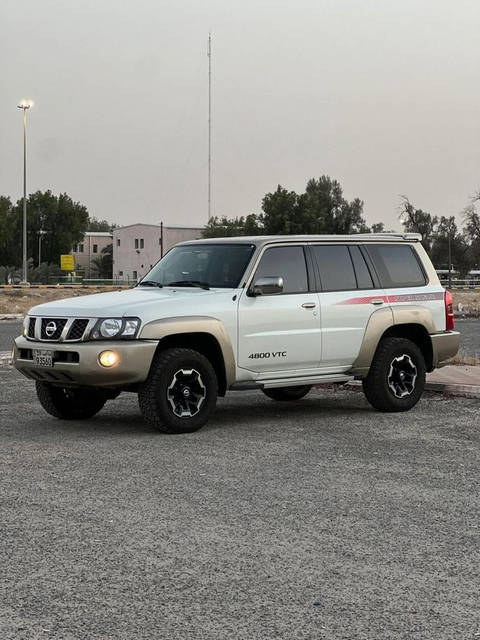 Used ⁦Nissan Patrol V (Y61) Facelift, 4.8 l, 2021⁩ in Kuwait, Al Farwānīyah by WHEELS CAR, White color.  | AUTO.AE | Listing #292857