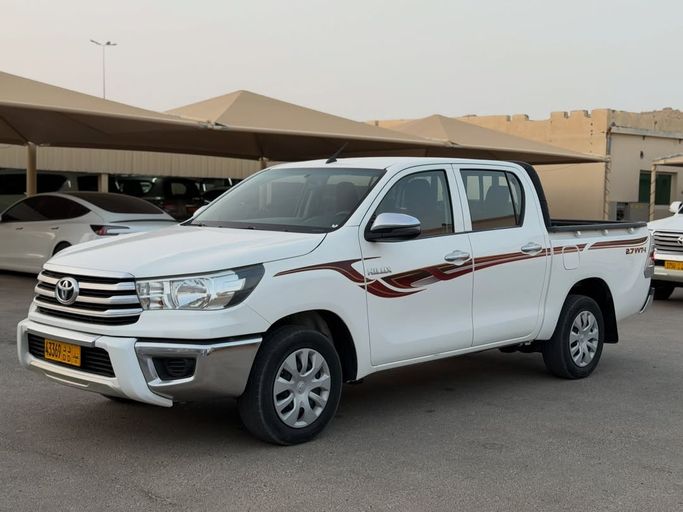 Used ⁦Toyota Hilux VIII, 2.7 l, 2019⁩ in Oman, Al Buraymī by معرض الصحراء للسيارات , White color.  | AUTO.AE | Listing #282924
