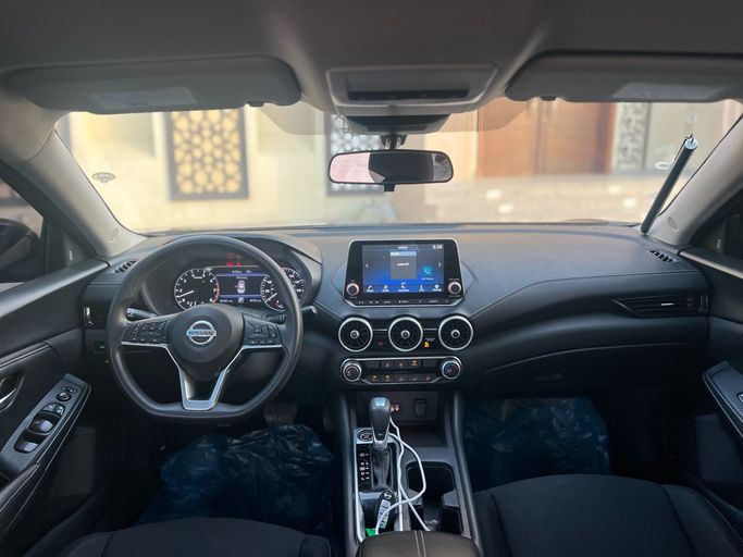 Подержанный Nissan Sentra VIII (B18) Рестайлинг, 2.0 л, 2023 в Оман, Барка’ от AL BALUSHI Тёмно-бордовый цвет. Американская | AUTO.AE | Объявление #263363