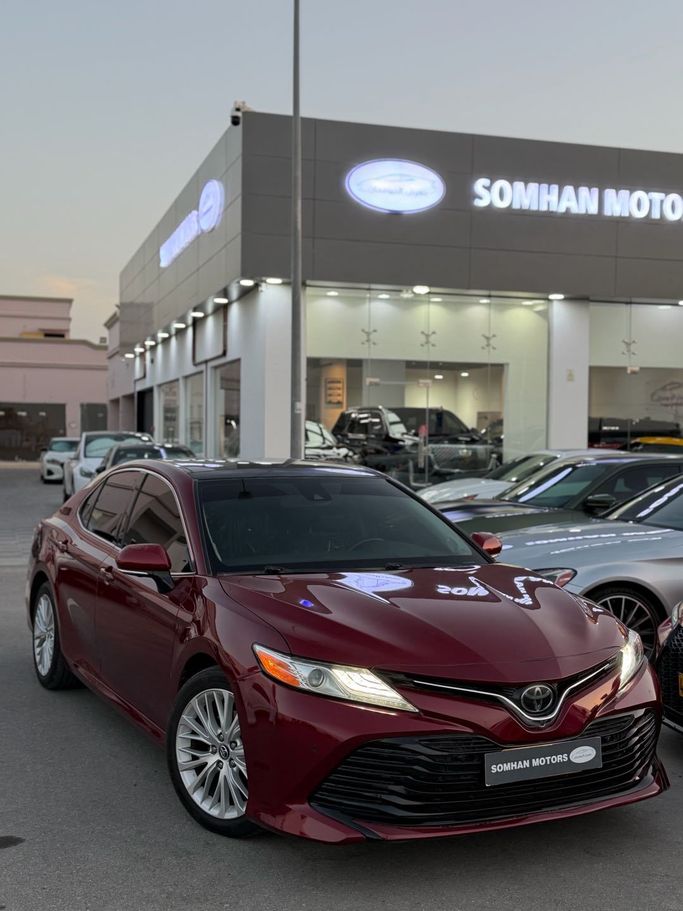 Подержанный Toyota Camry VIII (XV70), 3.5 л, 2019 в Оман, Барка’ от SOMHAN MOTORS Красный цвет. GCC | AUTO.AE | Объявление #255112