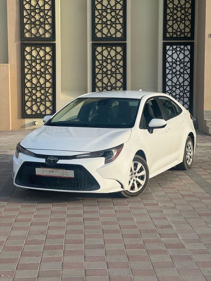 Подержанный Toyota Corolla XII (E210), 1.8 л, 2021 в Оман, Барка’ от AL BALUSHI Белый цвет.  | AUTO.AE | Объявление #252122