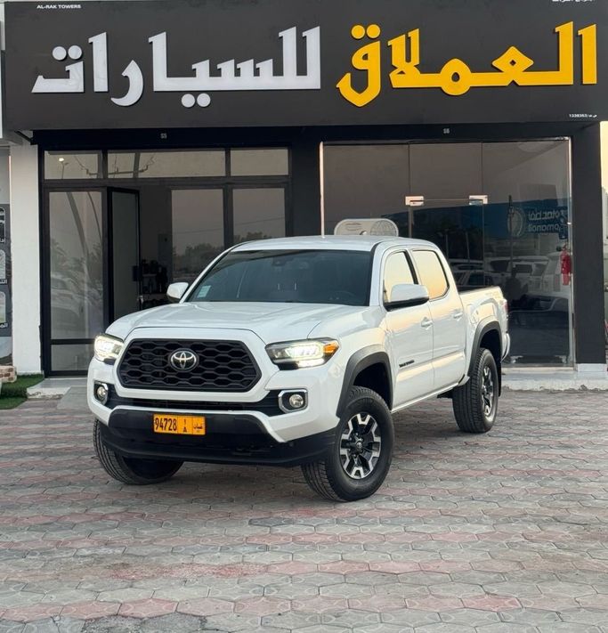 Подержанный Toyota Tacoma III, 3.5 л, 2021 в Оман, Барка’ от AL EMLAQ CARS Белый цвет. GCC | AUTO.AE | Объявление #256203