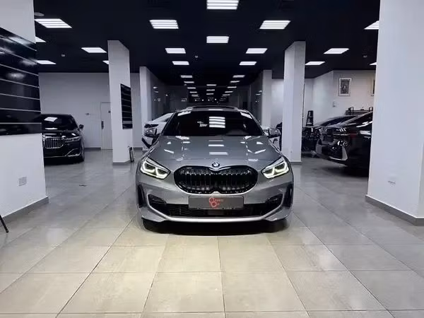 Подержанный BMW 1 Series 120i III (F40), 2.0 л, 2024 в Оман, Маскат от CLASSIC CAR Серый цвет. GCC | AUTO.AE | Объявление #254661