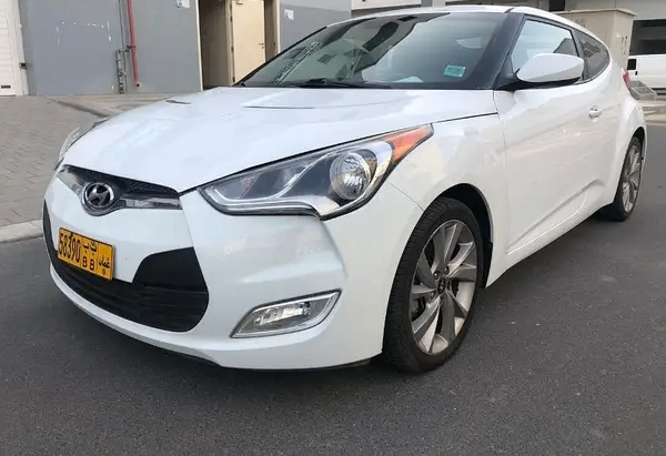 Подержанный Hyundai Veloster I Рестайлинг, 1.6 л, 2017 в ОАЭ от Al Dhabi Motors Белый цвет. Американская | AUTO.AE