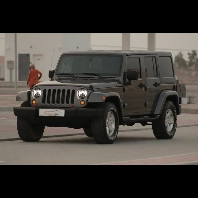 Used Jeep Wrangler III (JK), 3.6 l, 2016 in Oman, Muscat by SAFAKAT AL FAKAMA, Grey color.  | AUTO.AE | Listing #250419