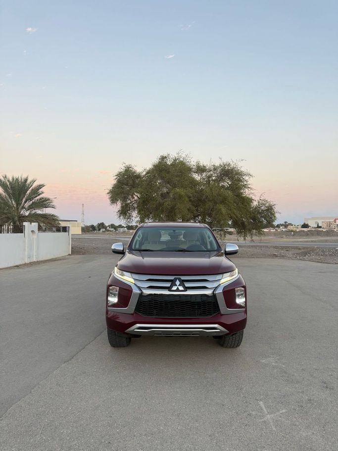 Подержанный Mitsubishi Montero Sport III Рестайлинг, 3.0 л, 2021 в Оман, Маскат от AL MOUJ CARS Бордовый цвет. GCC | AUTO.AE | Объявление #251617
