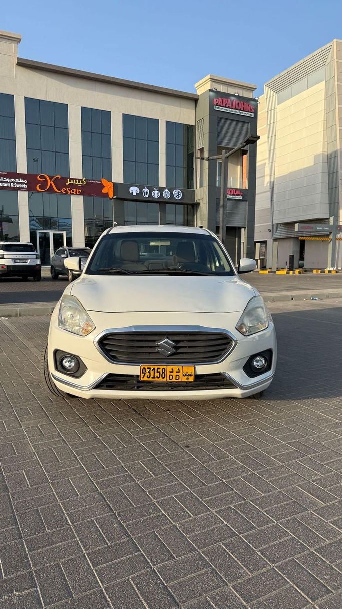 مستعملة Suzuki DZire ثالثاً فيس ليفت, 1.2 l, 2019 في في عمان, المسكات عنب طيب الشذا من AL MUHEEB MOTORS، اللون أبيض.  | AUTO.AE | إعلان #251778
