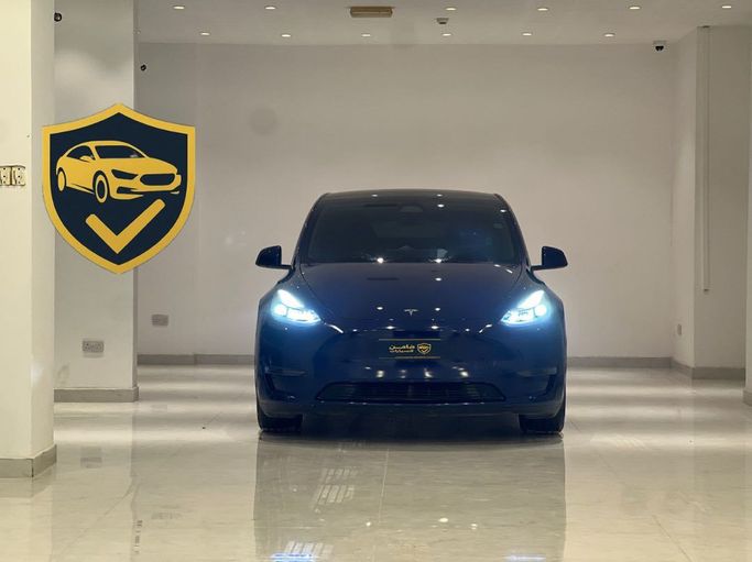 Подержанный Tesla Model Y Long Range I, 2024 в Оман, Маскат от Damin Motors Синий цвет. Американская | AUTO.AE | Объявление #255536