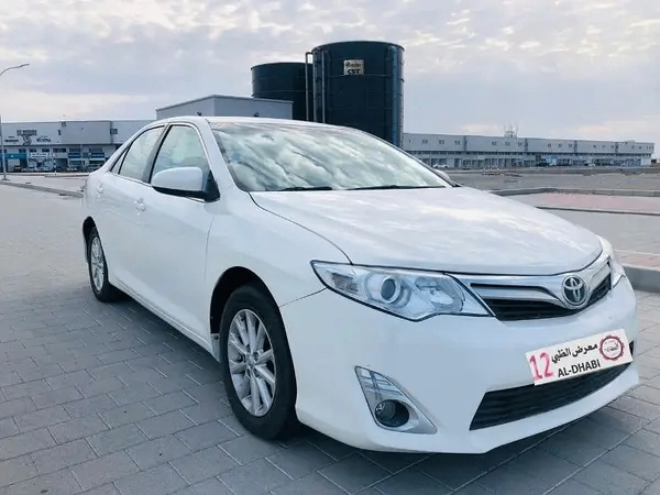 Used Toyota Camry VII (XV50) Facelift, 2.5 l, 2015 in UAE by Al Dhabi Motors, White color. GCC Specs | AUTO.AE