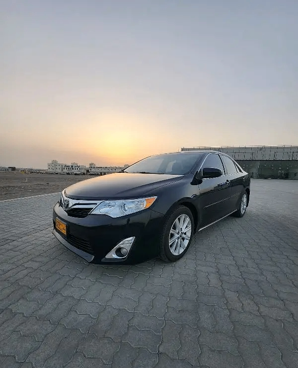 Used Toyota Camry VII (XV50) Facelift, 3.5 l, 2014 in UAE by Al Dhabi Motors, Black color. American Specs | AUTO.AE