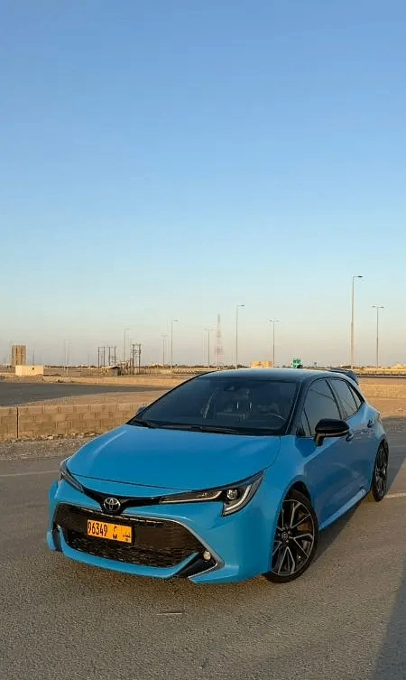 Подержанный Toyota Corolla XII (E210), 1.2 л, 2019 в Оман, Маскат от Al Dhabi Motors Голубой цвет. Американская | AUTO.AE