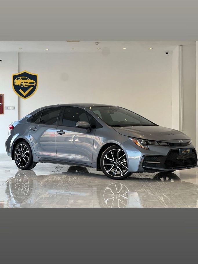 Подержанный Toyota Corolla XII (E210), 1.6 л, 2022 в Оман, Маскат от Damin Motors Серый цвет.  | AUTO.AE | Объявление #255683