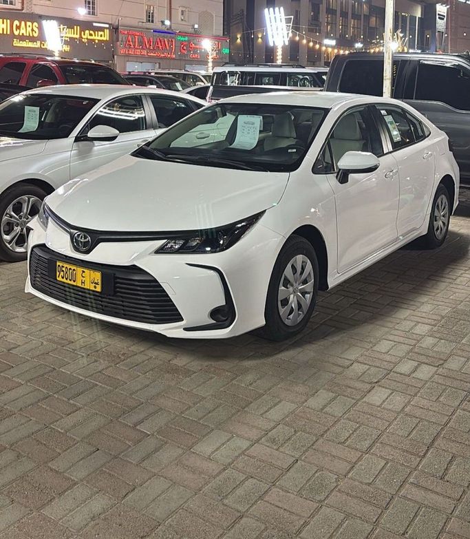 Подержанный Toyota Corolla XII (E210), 1.6 л, 2024 в Оман, Маскат от AL IZZ CAR SHOWROOM Белый цвет. Other | AUTO.AE | Объявление #256223