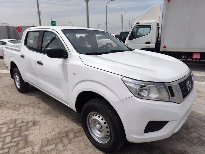 Подержанный Nissan Navara (Frontier) IV (D23), 2.5 л, 2020 в Рас-эль-Хайме от Al Jamal Automobile Showroom Белый цвет. GCC | AUTO.AE