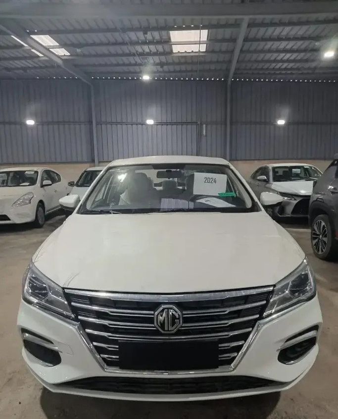 جديدة MG 5 (GT) أنا فيس ليفت, 1.5 l, 2024 في في المملكة العربية السعودية, المبرز من معرض رمز الإنجاز للسيارات، اللون أبيض.  | AUTO.AE | إعلان #270541