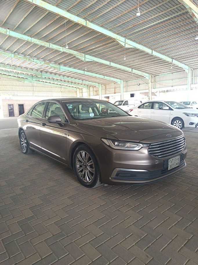 Подержанный Ford Taurus VII (CD4), 2.0 л, 2021 в Саудовская Аравия, Даммам от معرض رواحل للسيارات Коричневый цвет. GCC | AUTO.AE | Объявление #258403