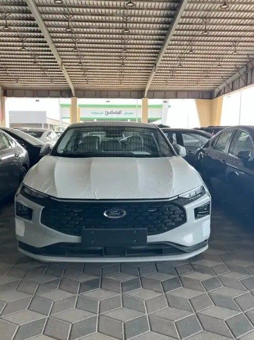 Новый Ford Taurus VII (CD4), 2.0 л, 2025 в Саудовская Аравия, Даммам от معرض مجموعة الفجر الجديد للسيارات Белый цвет.  | AUTO.AE | Объявление #258713