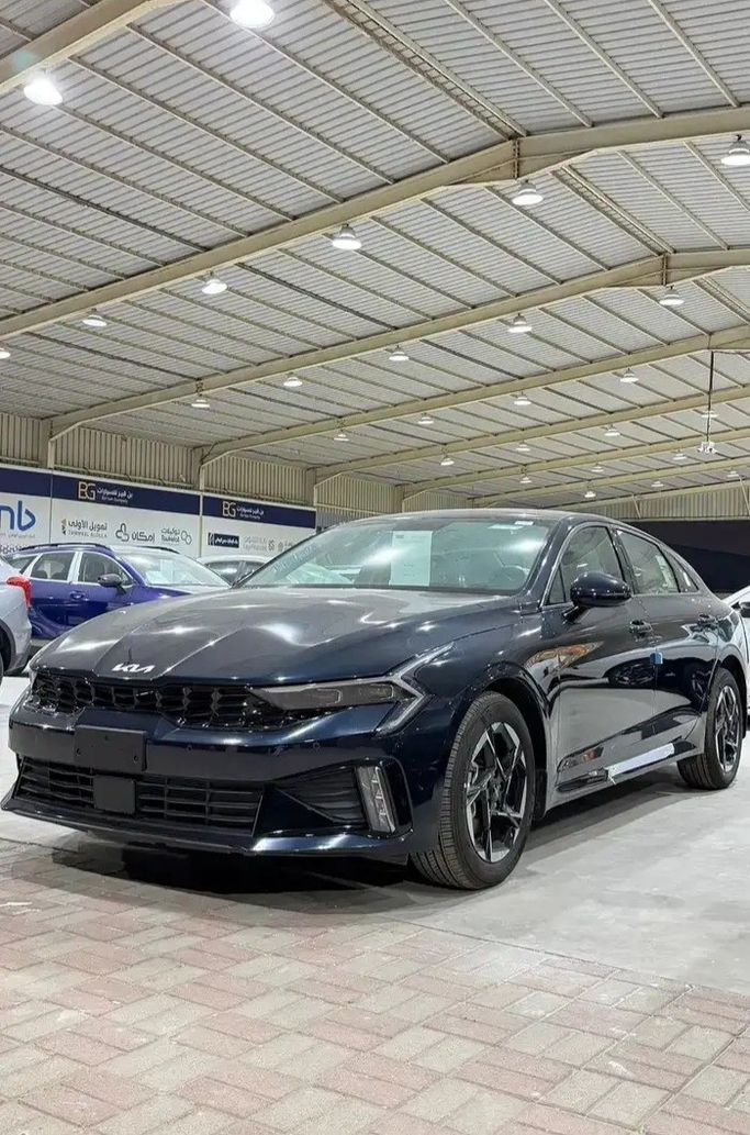 New Kia K5 III Facelift, 2.5 l, 2026 in Saudi Arabia, Dammam by شركة بن قير للسيارات, Blue color. GCC Specs | AUTO.AE | Listing #266948