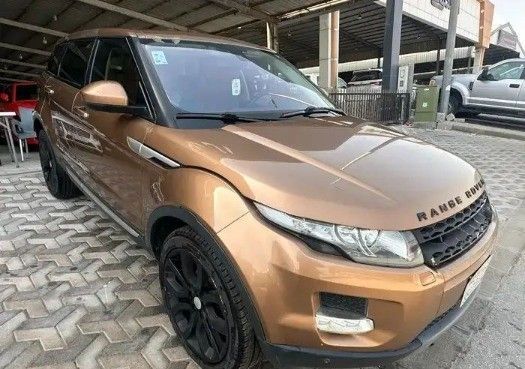 Used Land Rover Range Rover Evoque P240 I, 2.0 l, 2015 in Saudi Arabia, Dammam by معرض المهنا للسيارات, Brown color. GCC Specs | AUTO.AE | Listing #259407