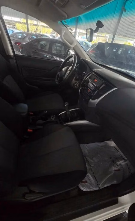 Подержанный Mitsubishi L200 V Рестайлинг, 2.4 л, 2022 в Саудовская Аравия, Даммам от معرض اسطول الدرة للسيارات Белый цвет.  | AUTO.AE | Объявление #296069 — фото 9 из 15