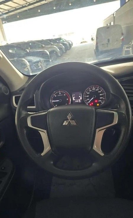Подержанный Mitsubishi L200 V Рестайлинг, 2.4 л, 2022 в Саудовская Аравия, Даммам от معرض اسطول الدرة للسيارات Белый цвет.  | AUTO.AE | Объявление #296069 — фото 11 из 15