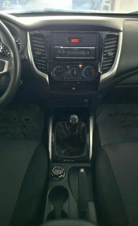 Подержанный Mitsubishi L200 V Рестайлинг, 2.4 л, 2022 в Саудовская Аравия, Даммам от معرض اسطول الدرة للسيارات Белый цвет.  | AUTO.AE | Объявление #296069 — фото 12 из 15