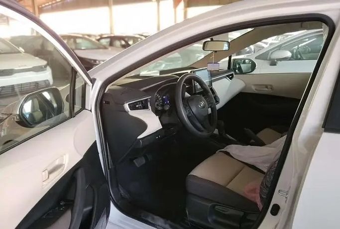 New Toyota Corolla Sporty XII (E210), 2.0 l, 2026 in Saudi Arabia, Dammam by معرض مركبة العز, White color.  | AUTO.AE | Listing #295844 — photo 7 of 9