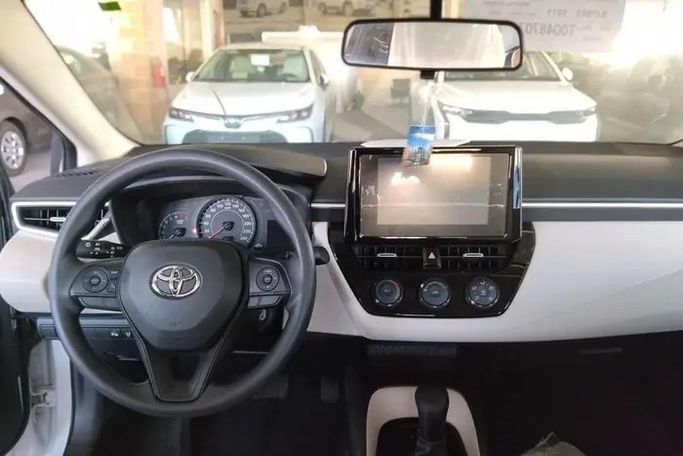 New Toyota Corolla Sporty XII (E210), 2.0 l, 2026 in Saudi Arabia, Dammam by معرض مركبة العز, White color.  | AUTO.AE | Listing #295844 — photo 8 of 9