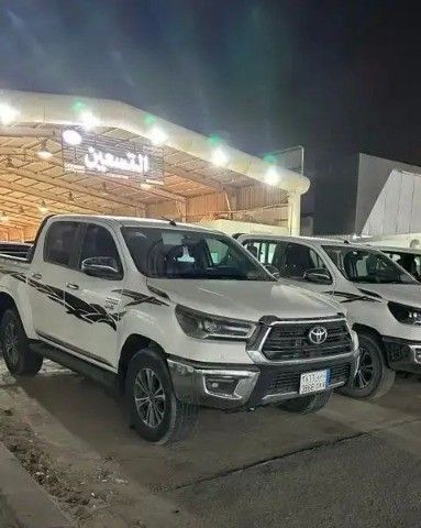 مستعملة Toyota Hilux فيس ليفت الثامن, 2.4 l, 2022 في في المملكة العربية السعودية, الدمام من معرض اعتماد الشرقية للسيارات، اللون أبيض.  | AUTO.AE | إعلان #261948