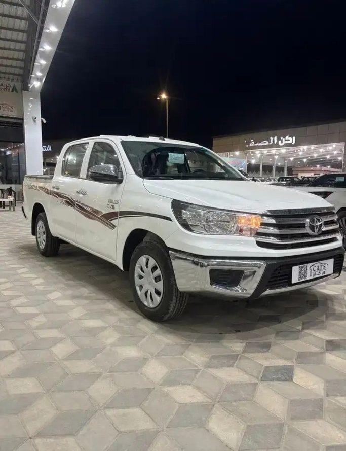 Новый Toyota Hilux VIII, 2.4 л, 2026 в Саудовская Аравия, Даммам от معرض ون كارز للسيارات One Cars Белый цвет. GCC | AUTO.AE | Объявление #276889