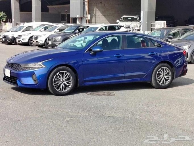 Used Kia K5 III, 2.0 l, 2021 in Saudi Arabia, Mecca by Al Awael Cars معرض الأوائل المميز للسيارات, Blue color.  | AUTO.AE | Listing #271829