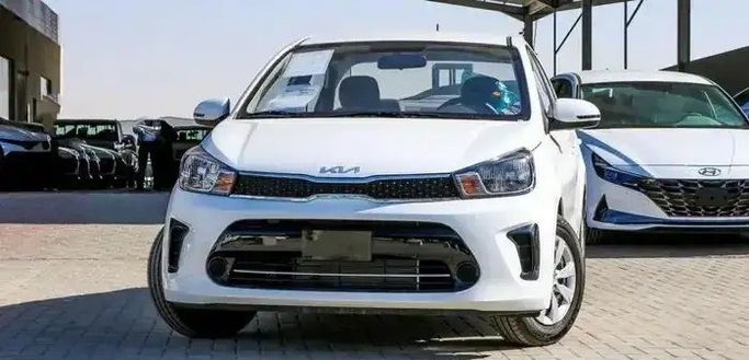 Новый Kia Pegas, 1.4 л, 2026 в Саудовская Аравия, Мекка от Rowad Al Eatemad رواد الإعتماد للسيارات Белый цвет.  | AUTO.AE | Объявление #270896