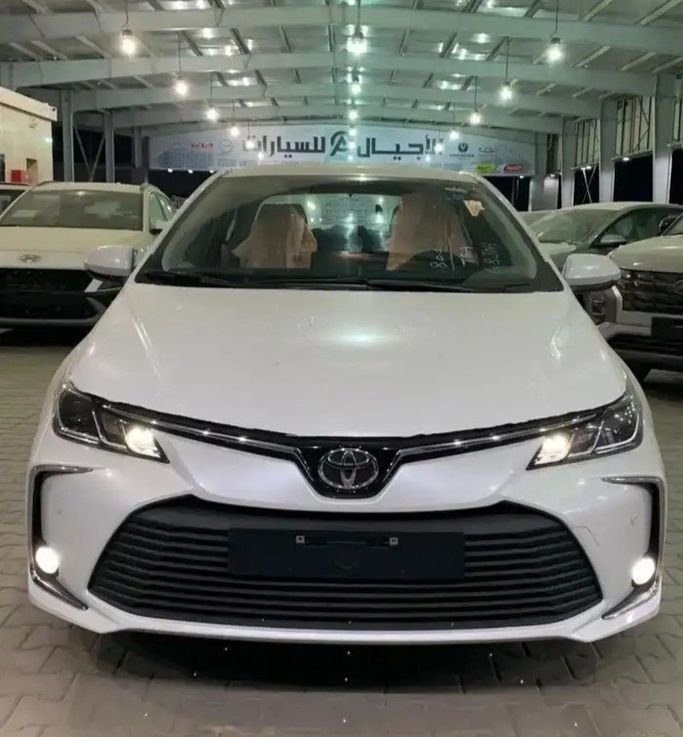 Новый Toyota Corolla Sporty XII (E210) Рестайлинг, 2.0 л, 2025 в Саудовская Аравия, Мекка от Alajyal Cars الأجيال للسيارات Белый цвет.  | AUTO.AE | Объявление #270578