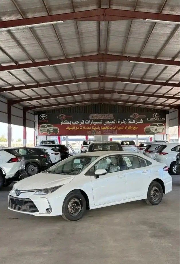 New Toyota Corolla Sporty XII (E210), 2.0 l, 2026 in Saudi Arabia, Medina by Zahrat Al Eis شركة زهرة العيص للسيارات, White color. GCC Specs | AUTO.AE | Listing #268079