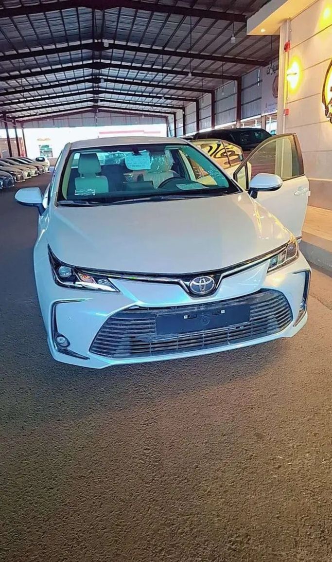 New Toyota Corolla Sporty XII (E210), 2.0 l, 2025 in Saudi Arabia, Medina by Qimmat Al Ma'arid  شركة قمة المعارض للسيارات, White color. Other | AUTO.AE | Listing #268756