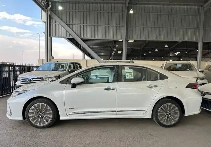 New Toyota Corolla Sporty XII (E210), 2.0 l, 2026 in Saudi Arabia, Medina by Faisal Al Tamayoz Cars معرض فيضل التميز للسيارات, White color. GCC Specs | AUTO.AE | Listing #269354