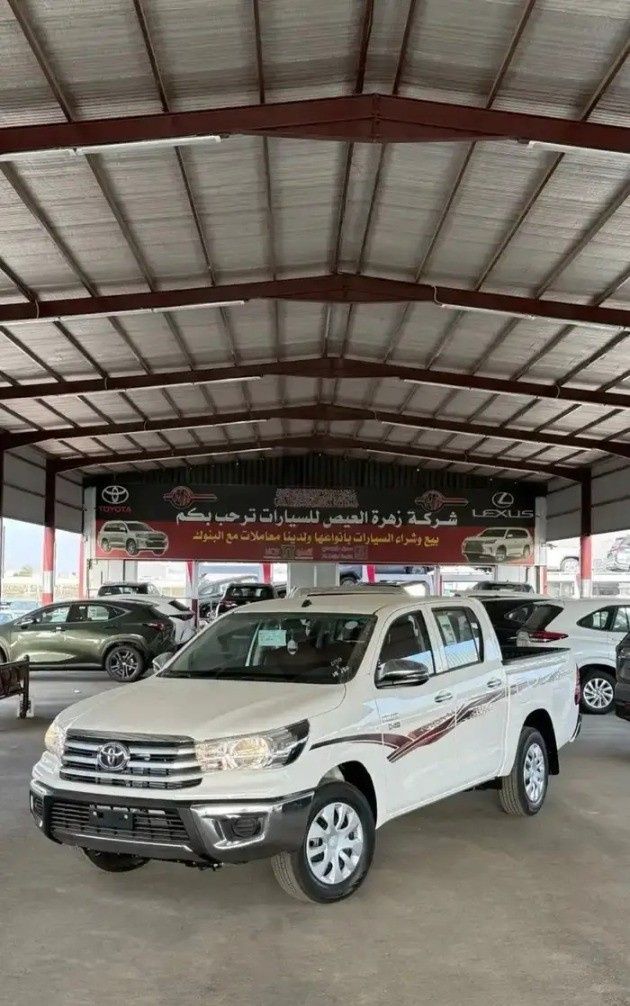 Новый Toyota Hilux VIII, 2.4 л, 2026 в Саудовская Аравия, Медина от Zahrat Al Eis شركة زهرة العيص للسيارات Белый цвет. GCC | AUTO.AE | Объявление #267938